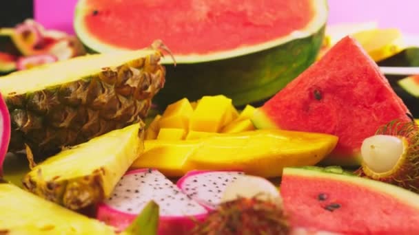 Mixed Tropical Fruits Closeup Fresh Fruit Sliced Background — Stock Video