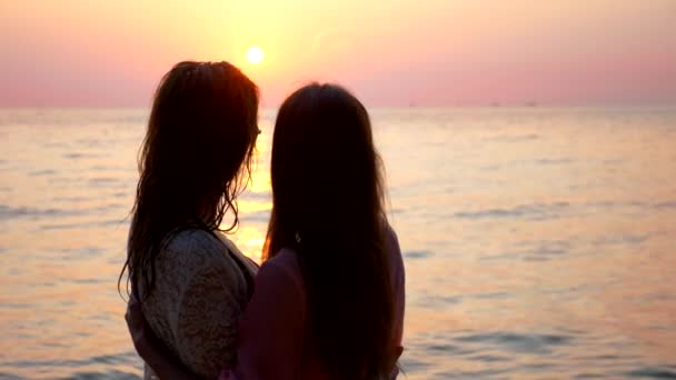 The concept of LGBT. Happy lesbian couple resting on beautiful tropical beach. — Stock Video