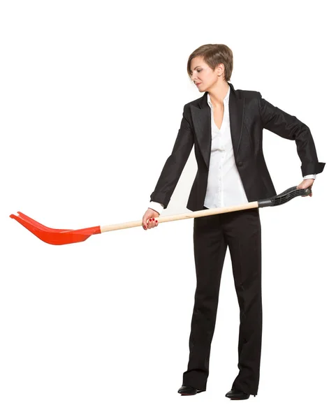 Alegoría. oficinista, gerente, mujer de negocios torturada con una pala sobre un fondo blanco — Foto de Stock