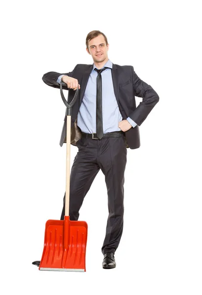 Allegory. office worker, manager, tortured businessman in suit and tie with a shovel on a white background — Stock Photo, Image