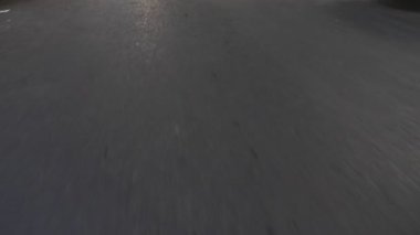 üzerinde bir araç sürerken asfalt. yukarıdan görünüm