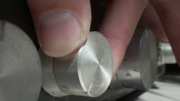 Super close up. macro shot. male hands twist the knobs of the mixing console — Stock Video