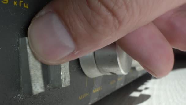 Super close up. macro shot. male hands twist the knobs of the mixing console — Stock Video