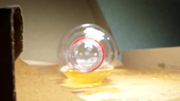 Super close-up. view of the inside of a plastic bottle with beer leftovers — Stock Video