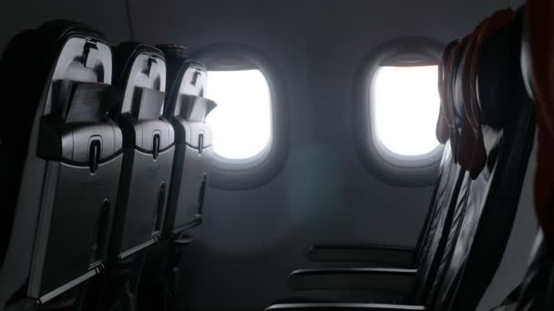 Empty passenger cabin of an airplane in flight. copy space — Stock Video