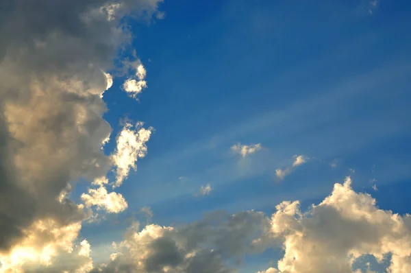 Sunbeam breaking through clouds — Stock Photo, Image