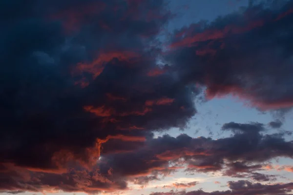 Storm clouds at sunset in bright colors — Stock Photo, Image