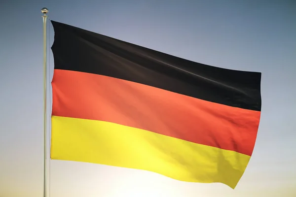 Duitsland vlag op zonsondergang hemel achtergrond — Stockfoto