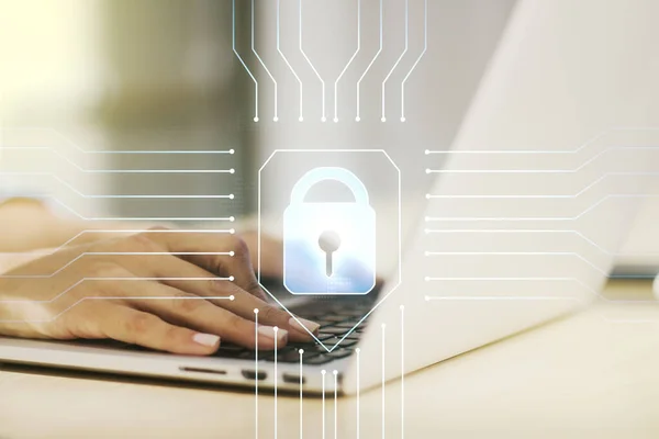 Double exposure of creative lock hologram with chip and hands typing on laptop on background. Information security concept — Stock Photo, Image