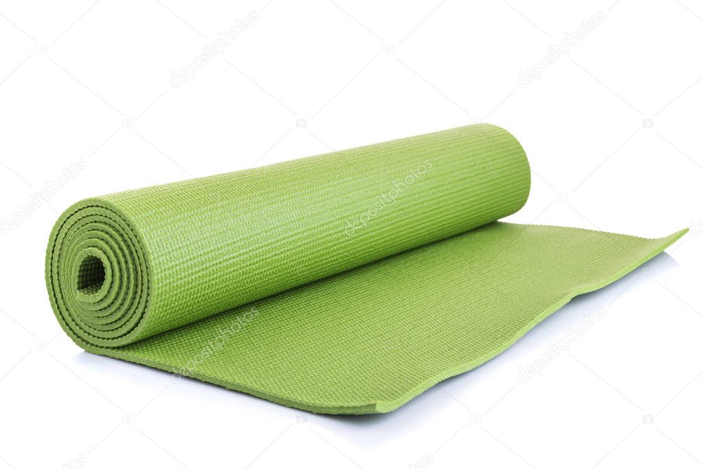 New green soft Yoga mat. Studio shot isolated on white background