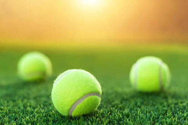 Close Tennis Ball Green Grass Court Sunset Effect Background — Stock Photo, Image