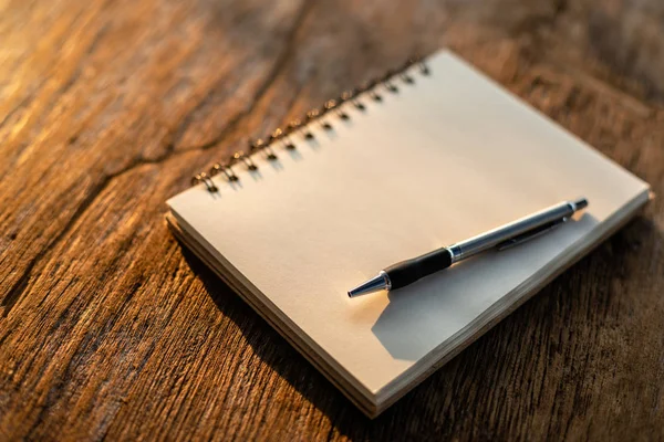 Top view of white book on old wooden plank background — Stock Photo, Image