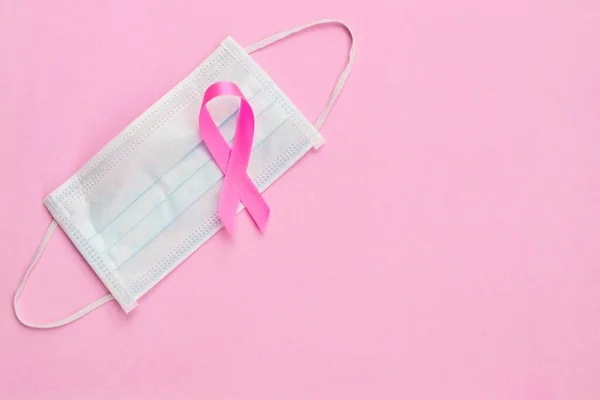 Breast Cancer Concept Top View Pink Ribbon Protective Mask Symbol — Stock Photo, Image
