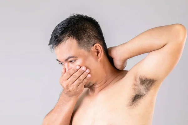 Bad Smell Underarm Rash Man Checking Smelling His Armpit Studio — Stock Photo, Image