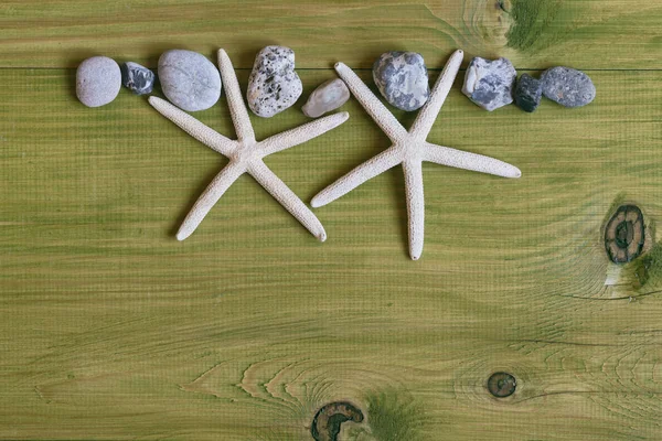 Image Two Starfish Stones Wooden Table Image Intentionally Toned — Stock Photo, Image