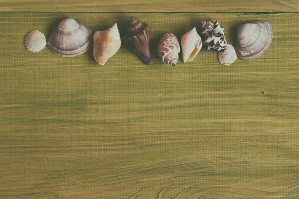 Kép Tengeri Kagylókból Fából Készült Asztal Kép Szándékosan Tónusú — Stock Fotó