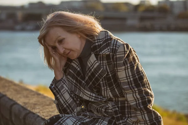 Sad Senior Woman Sitting River Alone Toned Image — Stock Photo, Image