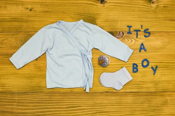 Text Boy Baby Supplies Wooden Table Toned Photo — Stock Photo, Image