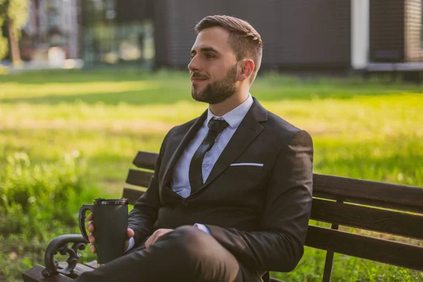 Elegant Businessman Enjoys Drinking Coffee While Sitting Outdoor Toned Image — Stock Photo, Image