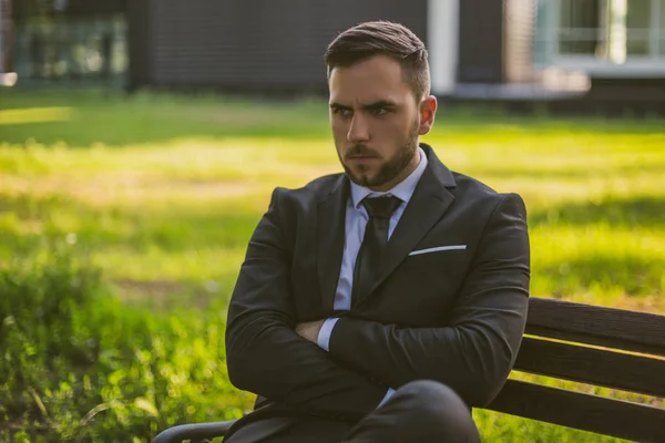 Angry Businessman Sitting Outdoor Toned Photo — Stock Photo, Image