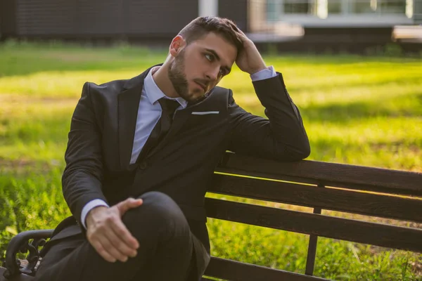 Worried Businessman Sitting Outdoor Toned Image — Stock Photo, Image