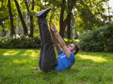 Handsome man practicing  in the park.