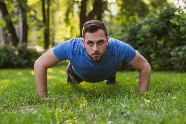 Handsome man practicing  in the park.