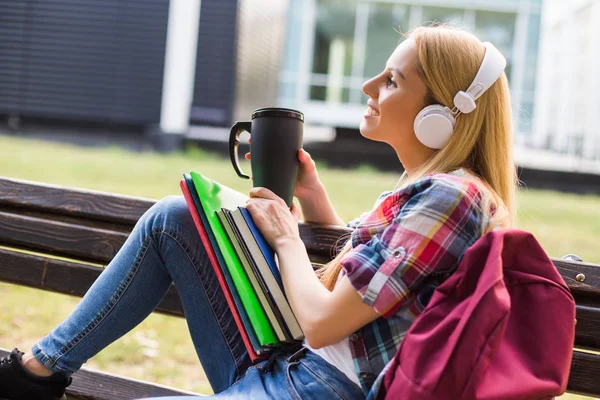 Female Student Headphones Enjoys Listening Music Drinking Coffee Outdoor — 图库照片
