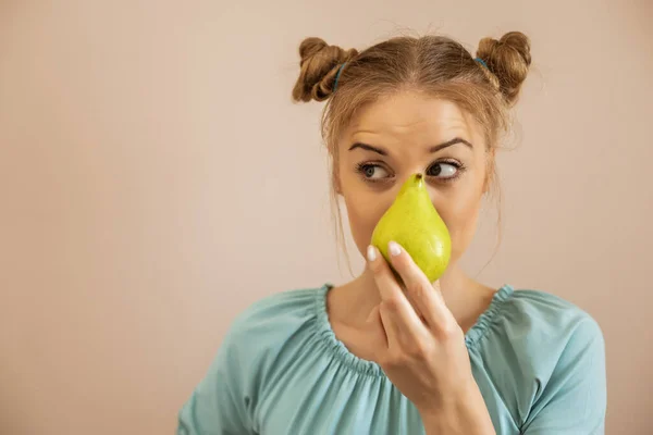 Portrait Playful Cute Woman Holding Pear Toned Image — Stock Photo, Image