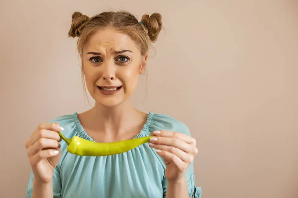 Cute Woman Grimacing While Holding Chilli Green Pepper Toned Image — Stock Photo, Image