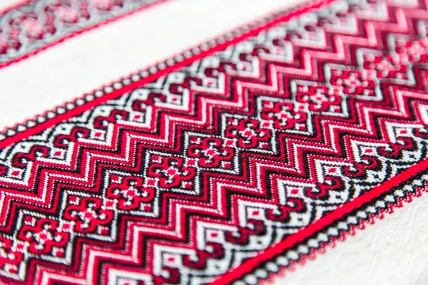 Embroidery. National clothes of Ukrainians. On the shirt for women or men embroidered cross-stitch ornament.