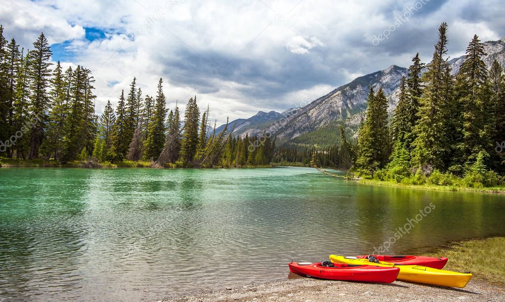 Canoes at the Bow River in Banff National Park Alberta Canada