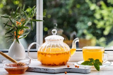 Deniz dikeni çayı ile görüntü.