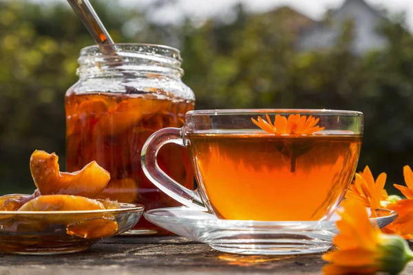 Tea Calendula Apple Jam Wooden Table — Stock Photo, Image