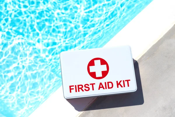 First aid kit near the swimming pool. Concept