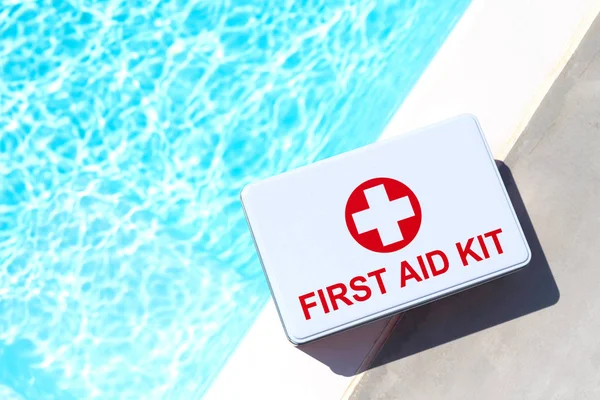 First aid kit near the swimming pool. Concept