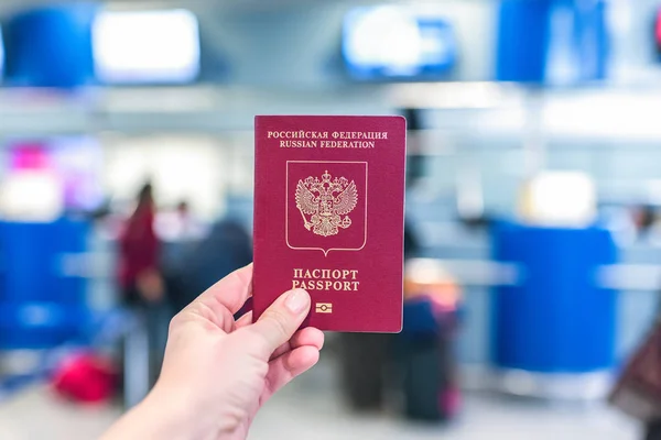 Female Holding Russian Pasport Airport Board — Stock Photo, Image