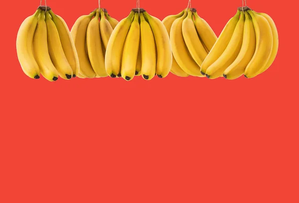 Dużo Dojrzałego Banana Miejscem Tekst Pomarańczowym Tle Koncepcja Zdrowej Żywności — Zdjęcie stockowe