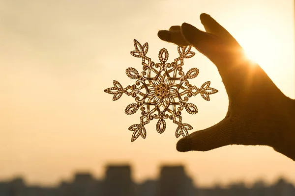 Female Hands Knitted Mitten Snowflake Sunset Sky Background Winter Christmas — Stock Photo, Image