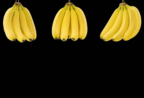 Dużo Dojrzałych Bananów Pęczek Miejscem Tekst Czarnym Tle Koncepcja Zdrowej — Zdjęcie stockowe