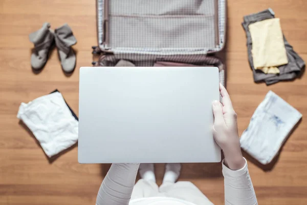 Top View Woman Hands Packing Laptop Luggage Suitcase New Journey — Stock Photo, Image