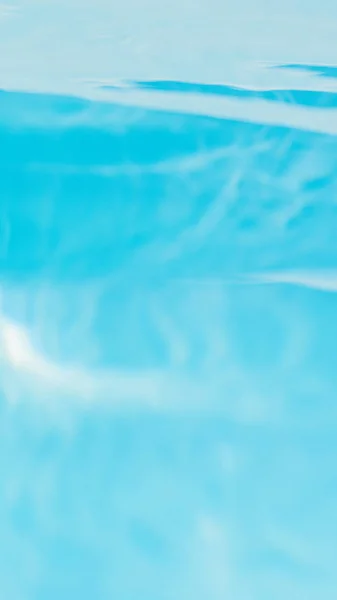 Transparent underwater texture and background of pool water