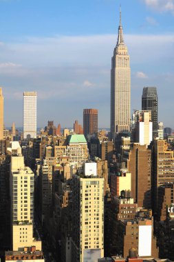 New York 'lu Empire State Binası Manhattan gökdelenleri ve gökdelenleri alacakaranlıkta. 