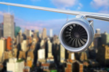 Gökyüzünde uçağın kanadının kırpılmış görüntüsü 