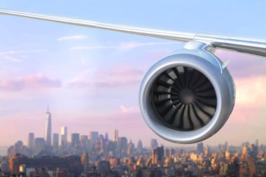 Gökyüzünde uçağın kanadının kırpılmış görüntüsü 