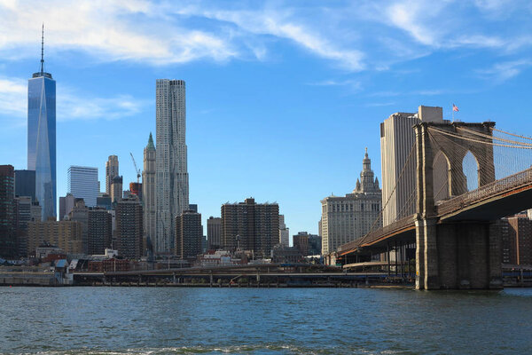 View on New York City and Brooklyn Bridge from Hudson river.
