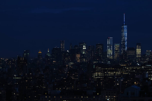 View of night midtown of Manhattan on sunset. Panorama of skyscrapers of New York City, Manhattan. Top View