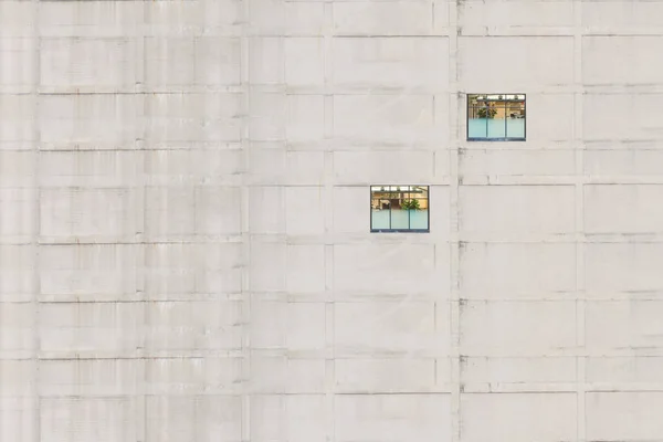 Creative picture of one office window on the concrete building. Concept.