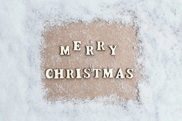 View Snow Texture Craft Paper Middle Inscription Merry Christmas Wooden — Stock Photo, Image