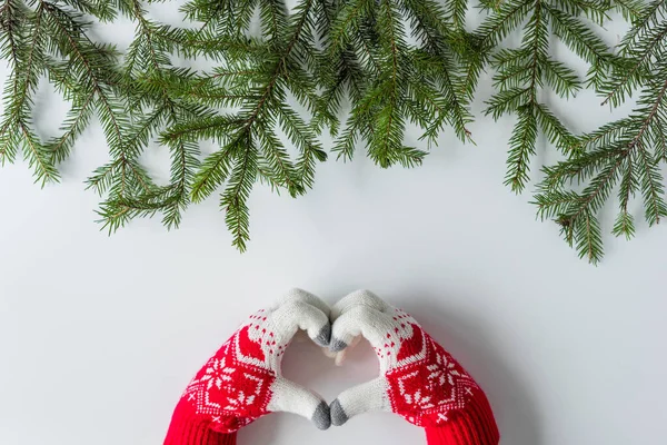 Woman Winter Gloves Showing Heart Shape White Wood Table Christmas — Stock Photo, Image